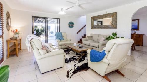 Sandstone Point House | Relax & Unwind Poolside Paradise