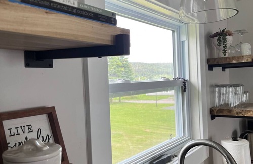 Harbour Grace House | Relax with the whole family at this quiet and peaceful getaway cottage.