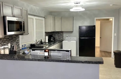 Orange House | Relax with your family in this newly renovated home away from home.
