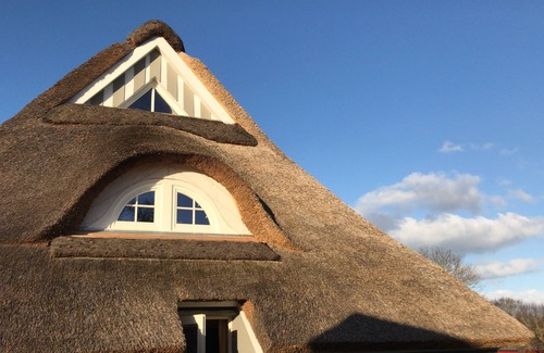 Puttgarden House | relaxation comes under thatch......with a sauna