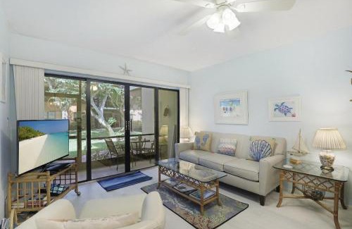 Marco Island House | Relaxing condo with two pools and steps to beach
