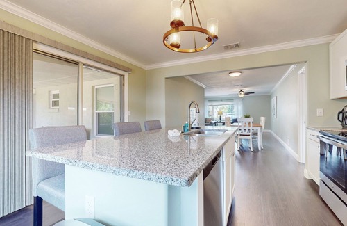 Port Orange House | Relaxing, single-level home with a sunroom, large yard, central AC, & fast WiFi