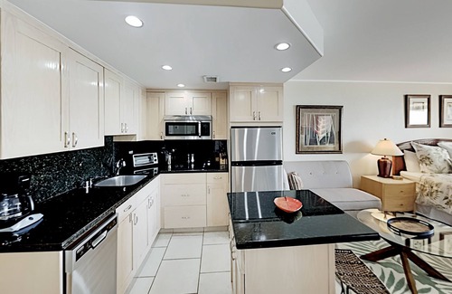 Honokowai Condo | Remodeled Beachfront Studio with pool, hot tub, ocean views, & private lanai