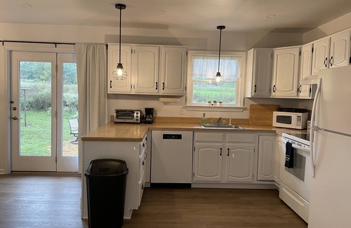 Mount Aetna House | Remodeled country home in neighborhood with Amish farms, fire pit in back yard