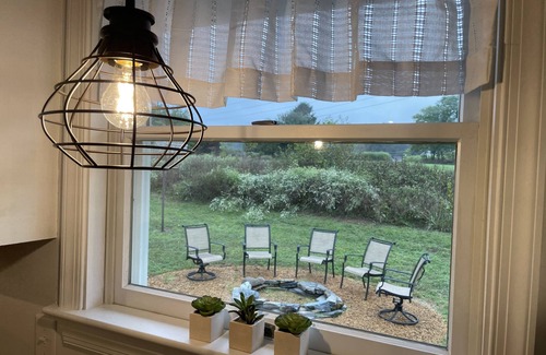 Mount Aetna House | Remodeled country home in neighborhood with Amish farms, fire pit in back yard