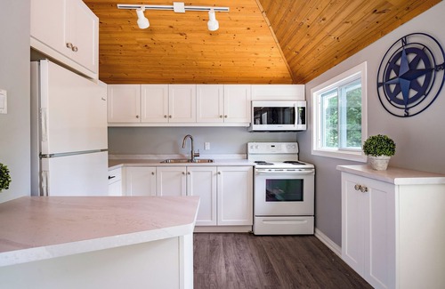 Sauble Beach Cottage | Renovated 4 Bedroom 2 minute walk to beach!