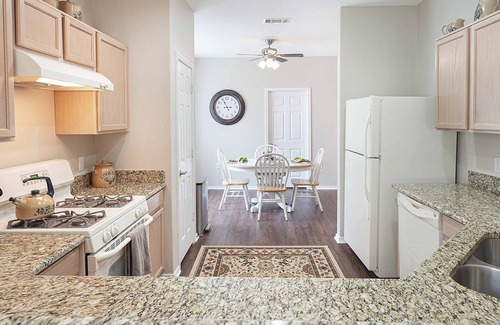Georgetown Condo | Renovated duplex backing up to a private green space