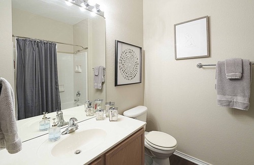 Georgetown Condo | Renovated duplex backing up to a private green space