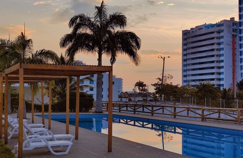 Tonsupa Apartment | Resort Playa Azul Tonsupa Apartment with a view of 2 rooms.