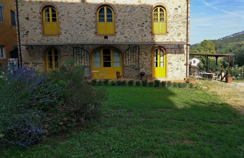 Sant'Andrea di Compito House | Restored barn with large pool and mountain stream