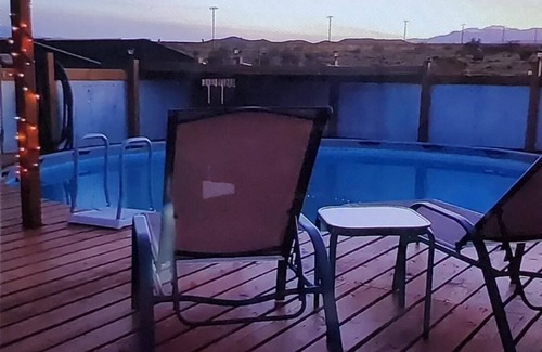 Joshua Tree RV Rental | Retro trailer in fun desert setting with private fire pit