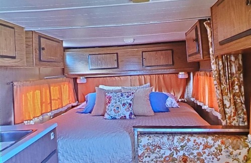 Joshua Tree RV Rental | Retro trailer in fun desert setting with private fire pit