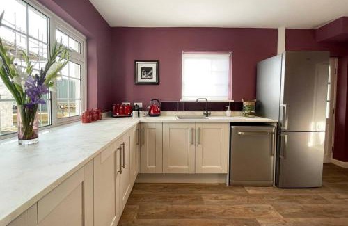 Llanddeiniolen House | Rhoslan. Boutique style farmhouse in Snowdonia