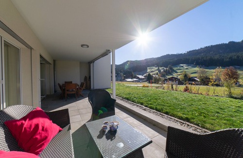 Wildhaus Apartment | Rietgarten - 4.5-room garden flat with mountain view