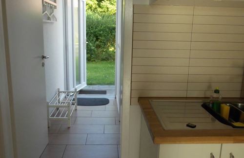 Wesenberg Apartment | Right on the lake - plenty of space for family & friends, modern, terrace, boat rental