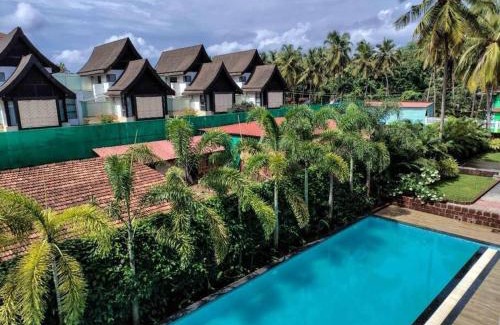 Nerul Apartment | Ripples:Pool facing/RiverView/7 mins to Coco Beach
