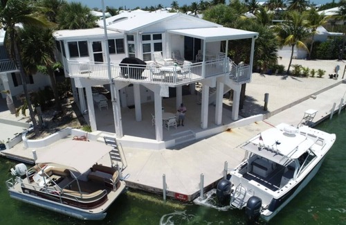 Cutthroat Harbor Estates House | Rise And Shine On The Water