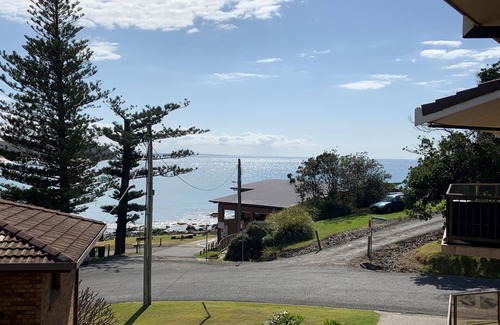 Black Head Apartment | Rise to the gentle sound of the ocean and kisses from the sun to relax