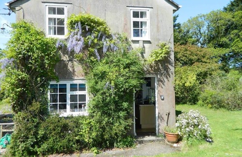 Holmebridge House | River Cottage a country retreat in wooded gardens