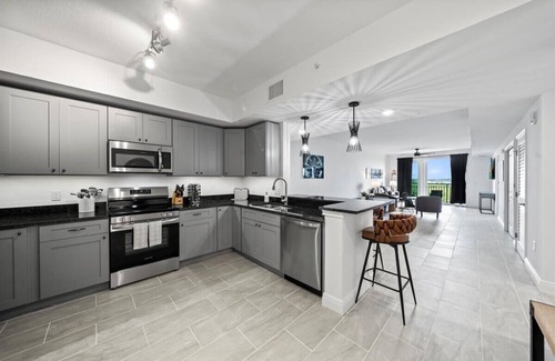 Merritt Island Condo | RIVER FLY IN: The Cocoa, River & Runway View