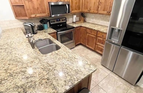 New Braunfels Condo | Riverbank Bliss at Rio Guadalupe | WIFI | Stunning Views