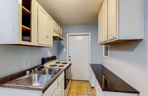 China Spring House | Riverfront guest house with private patio, river views, washer/dryer, streaming