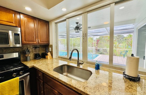 Sunrise Villa | Riverfront King Bed Pool Nearby Beach