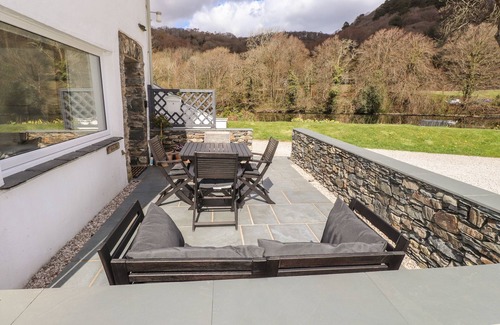 Newby Bridge Cottage | RIVERSIDE HIDEAWAY, pet friendly, with open fire in Newby Bridge