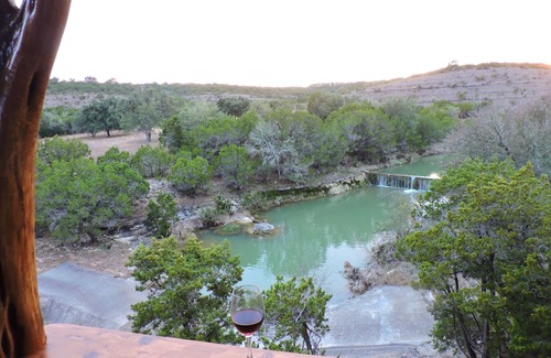 Wimberley House | Romantic hideaway nestled along Lone Man Creek. Views to the falls and hills