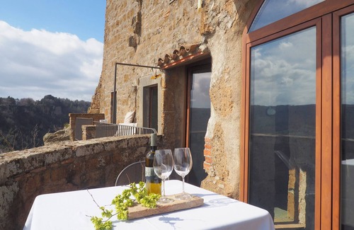 Civita di Bagnoregio Apartment | Romantic home carved into the rock with breathtaking views