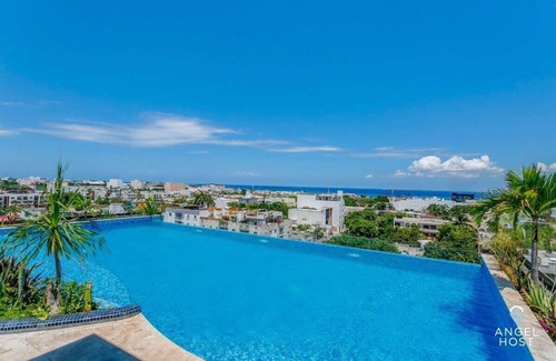 Centro Apartment | Rooftop Pool Retreat | Fiber WiFi | Steps to Beach