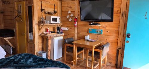 Cedaredge Cabin | Room with 1 King bed and 1 Queen bed at the Cedaredge Lodge