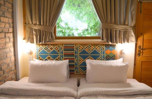 Chitral Hotel | Roomy Hindukush Sarai