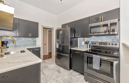 Frederick Apartment | Royalty on the Park: bar, movie theater, & patio