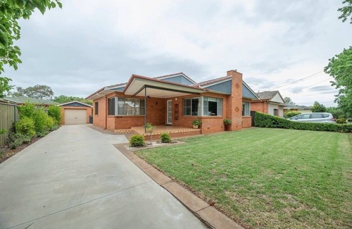 Dubbo House | Roycox Cottage - Charming Escape, Fireplace