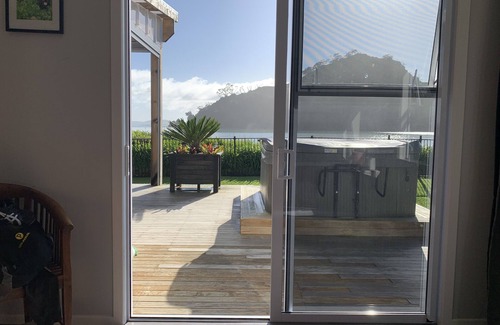 Pataua House | Ruahau - Absolute Beachfront - Luxury House and Cabin - Bikes, Kayaks, Spa, Pets
