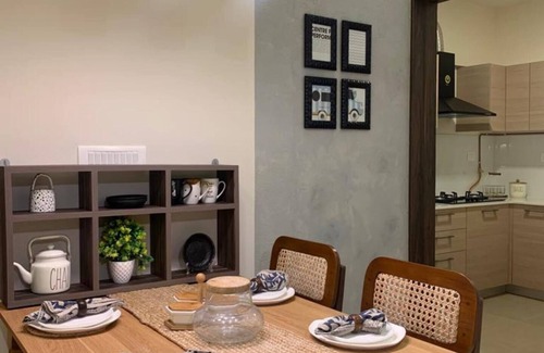 Bengaluru Apartment | Rustic 2BR in Bharatiya City