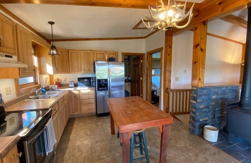 Opheim Cabin | Rustic and Secluded 1 Bedroom Cabin Retreat. Located on Private Stocked Pond.