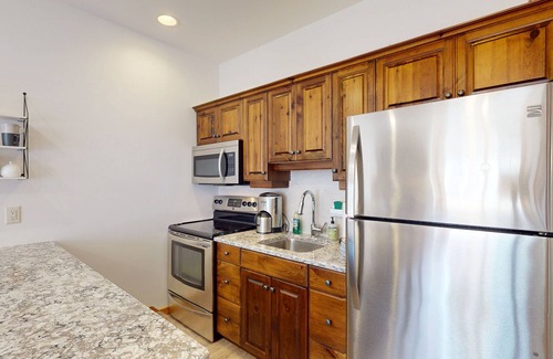 Big White Ski Resort House | Rustic haven w/dog & family-friendly layout w/private hot tub - walk to dining