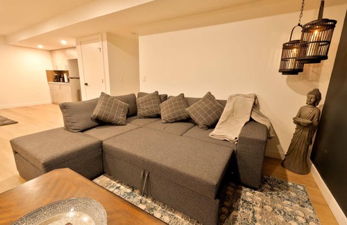 Airdrie Apartment | Rustic Lake‑Front Private Basement Suite Court Access & Gym