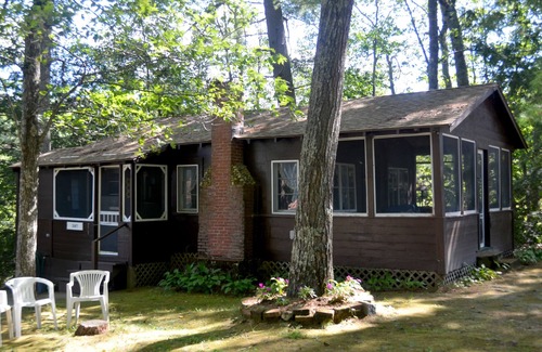 Gilmanton IW Cottage | Rustic Lakeside Cottage w/natural sand beach, crystal-clear water! Pet-Friendly