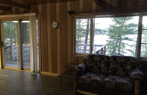 West Glacier Cabin | Rustic Lakeside Cabin- 3 miles from Glacier Park- get own beach & dock!