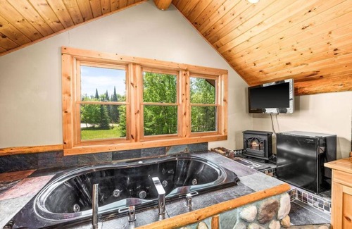 Bovey House | Rustic log home with lots of room to relax.