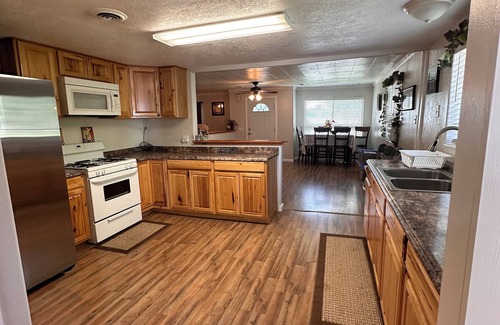 Maeser House | Rustic nice home in Vernal UT 2 bedrooms with queen beds 1 full bathroom.