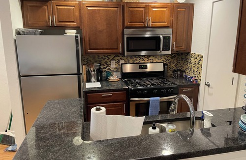 South Lamar Condo | Rustic Pool Front Condo with AC, High Speed Wifi in Beautiful Austin, TX