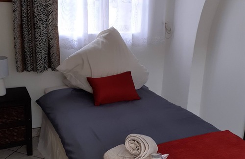 Benoni House | Rustic Red Self catering country life close to OR Tambo International