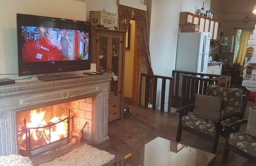 Sao Francisco de Paula House | Rustic Stone House in Condominium.