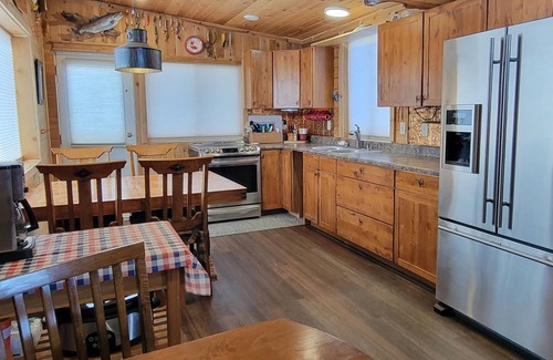 Laramie Cottage | Rustic Wyoming Lake Cottage with nMountains Views.