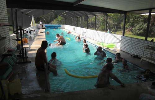 New Smyrna Beach House | RV NSB Sun & Shade Tree, Pool & Picnic RV Vacation