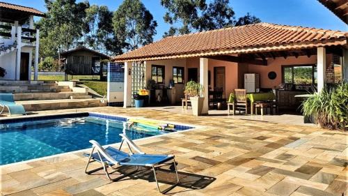 Quadra House | Sítio Aconchegante com Piscina e Wi-Fi
